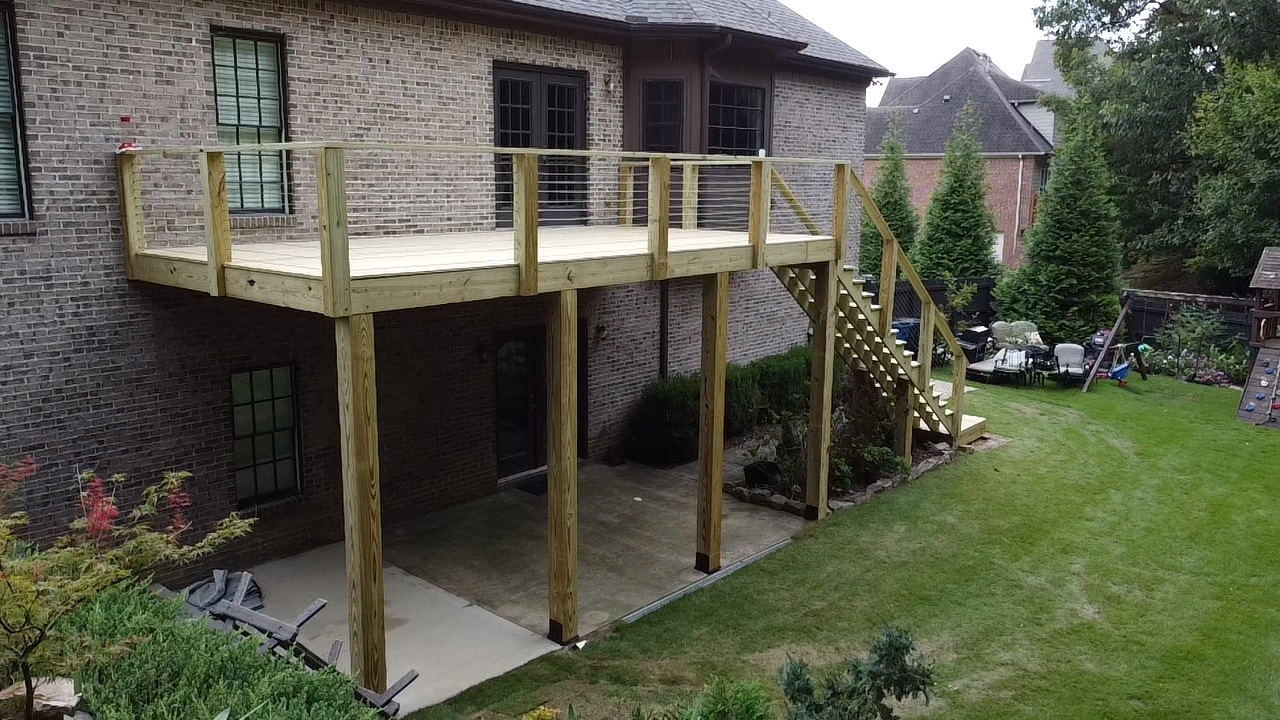 Custom deck railing built by Redbone Woodworks