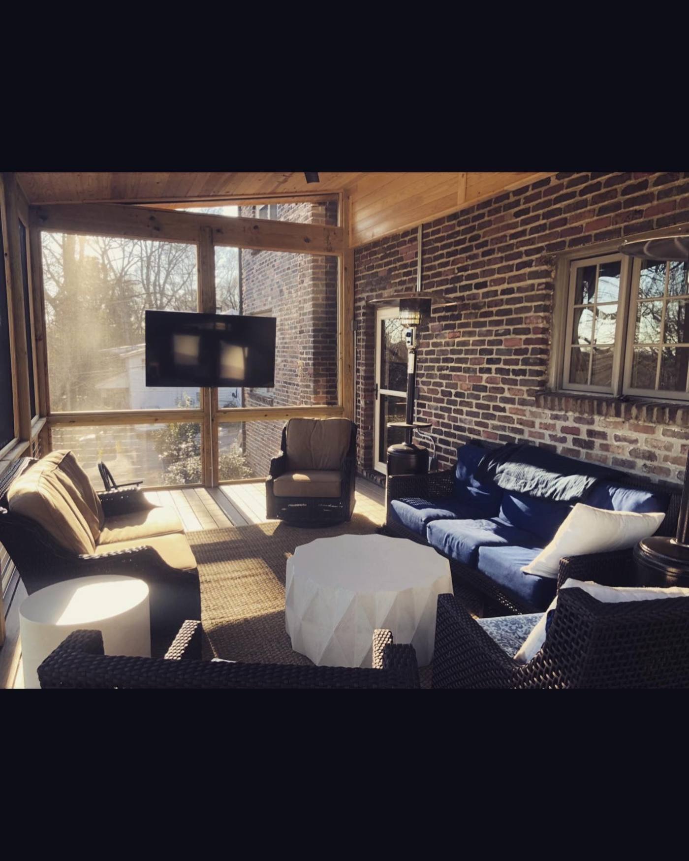 Finished screened porch interior built by Redbone Woodworks