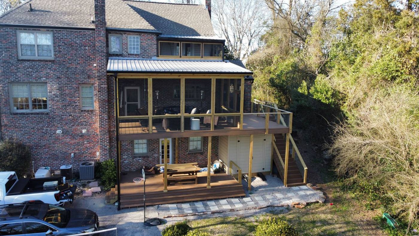 Screened porch built by Redbone Woodworks